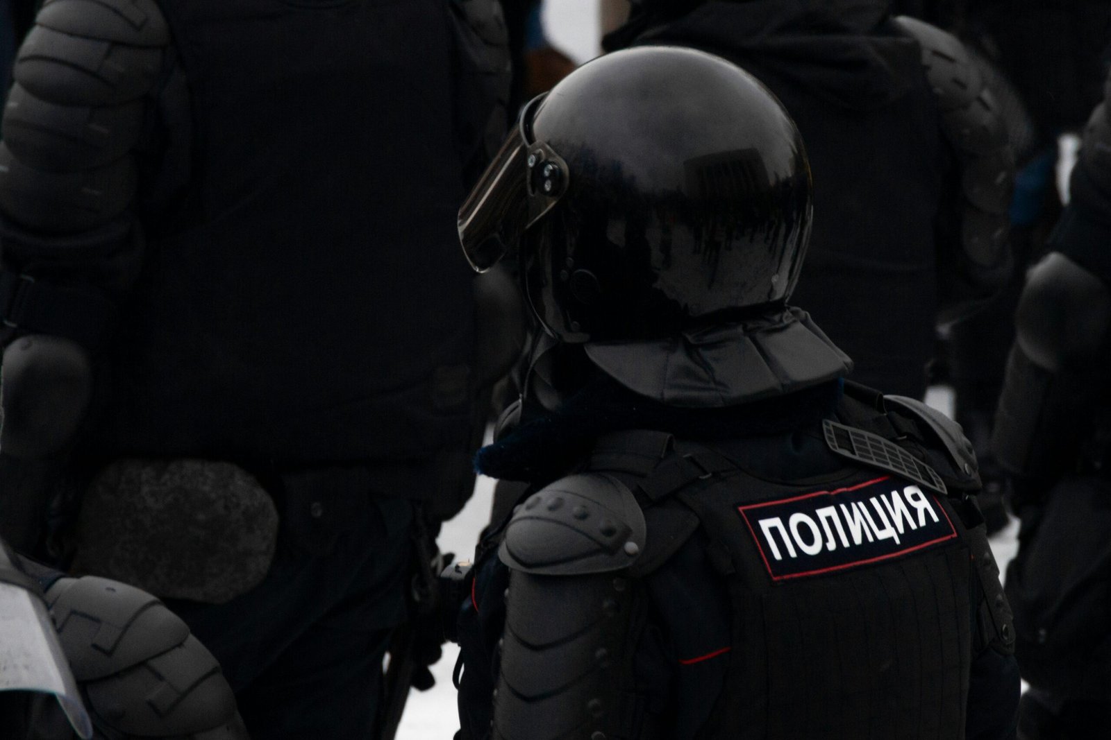 2 police men in black suit