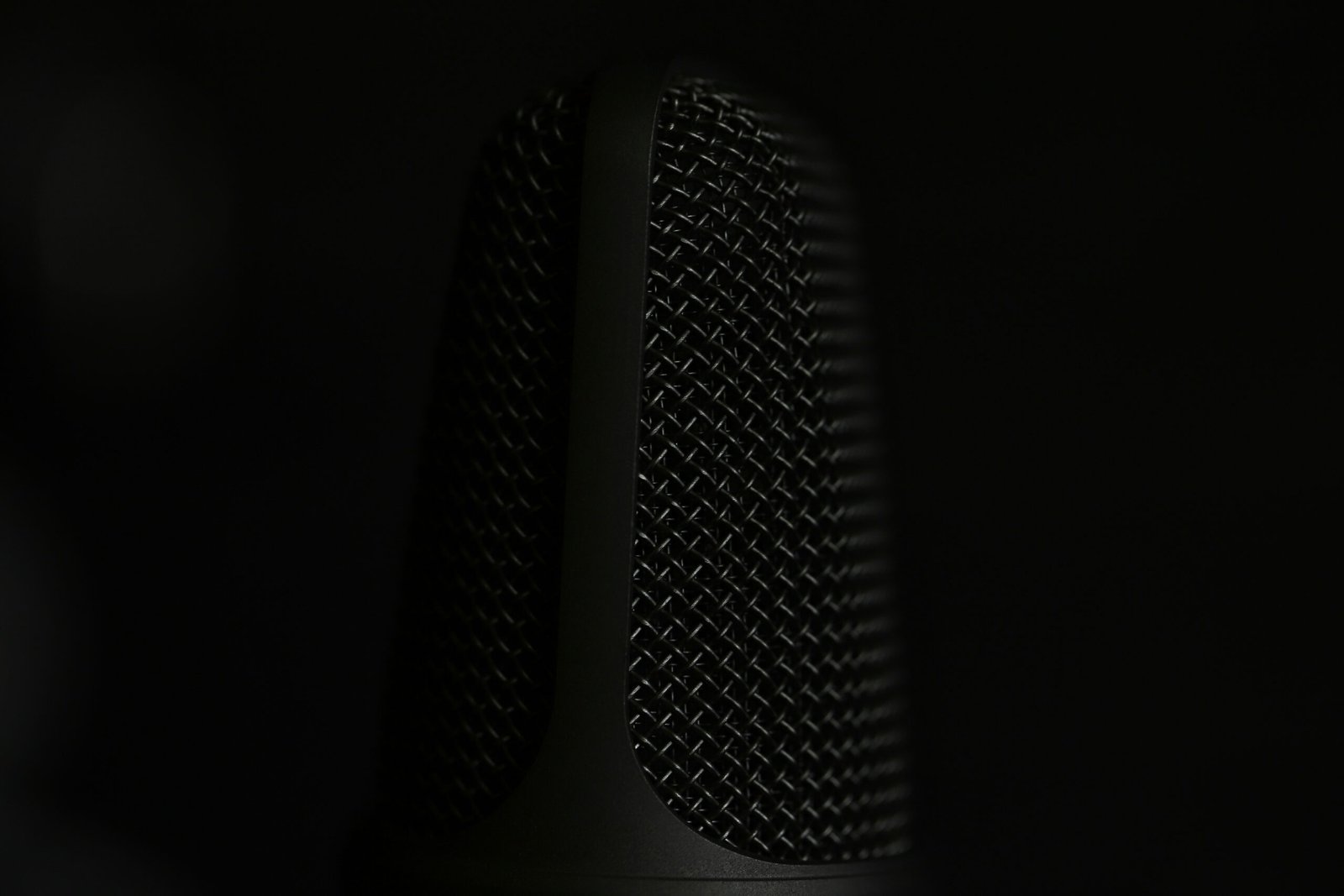 a close up of a microphone in the dark